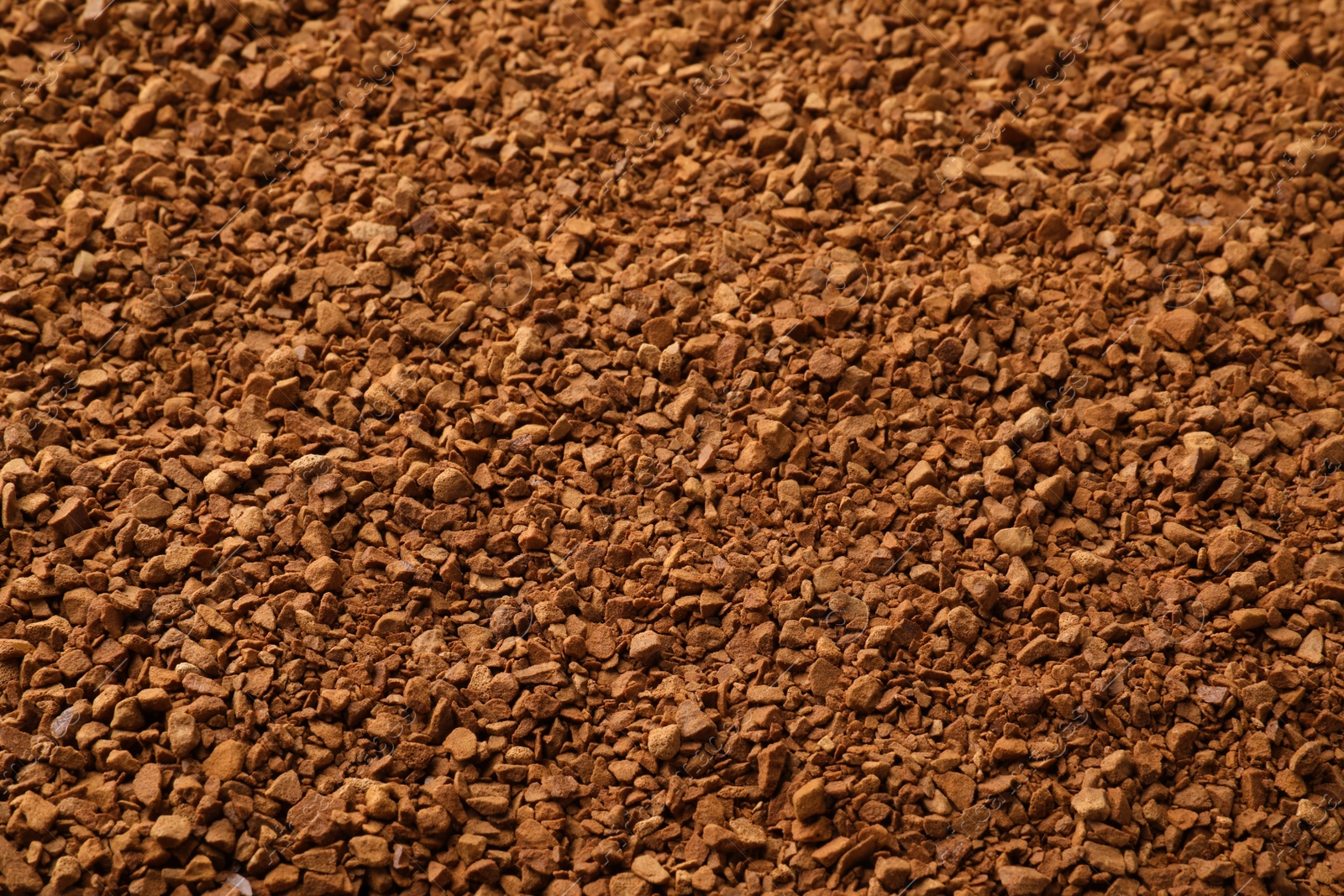 Photo of Aromatic instant coffee as background, closeup view