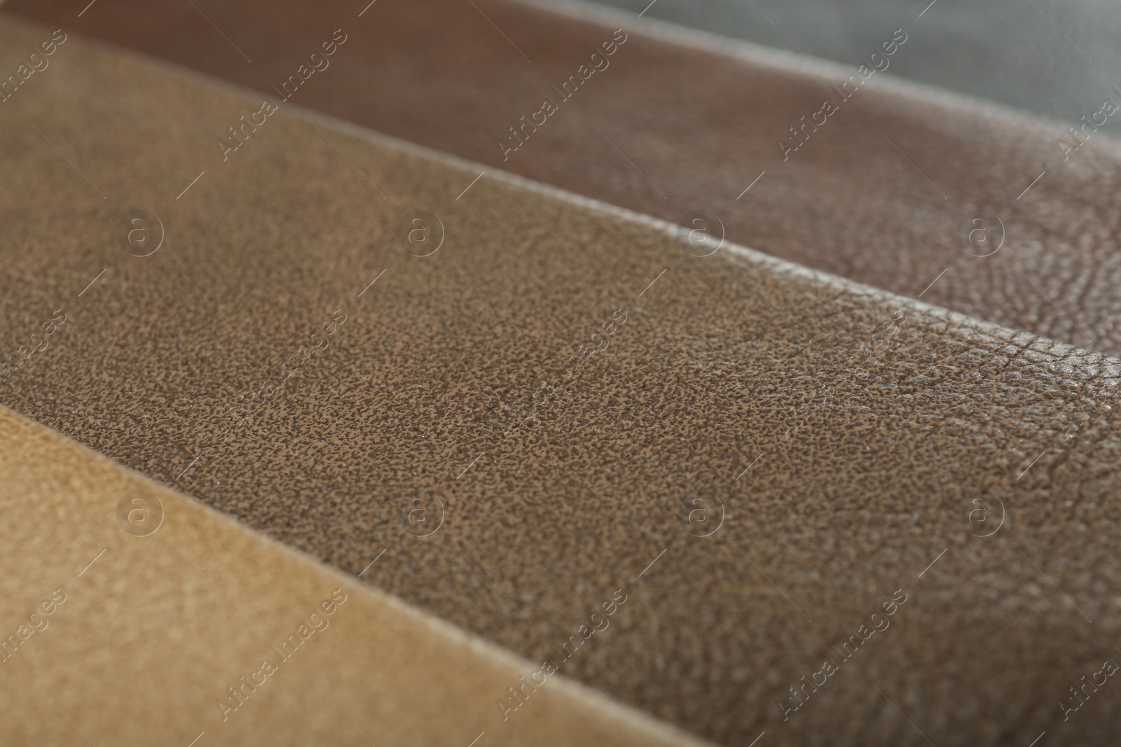 Photo of Different natural types of leather as background, closeup view