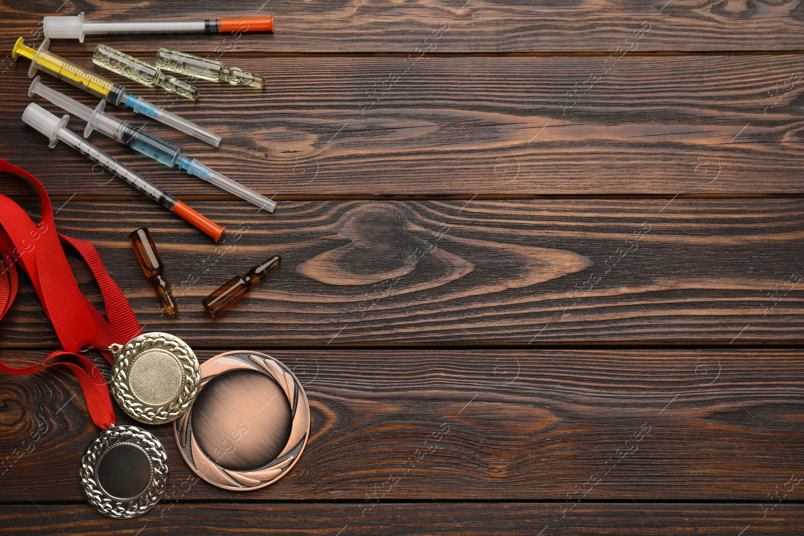 Photo of Flat lay composition with drugs on wooden background, space for text. Doping control