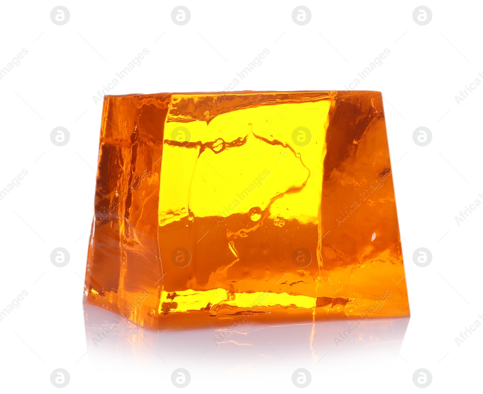 Photo of Tasty natural jelly cube isolated on white