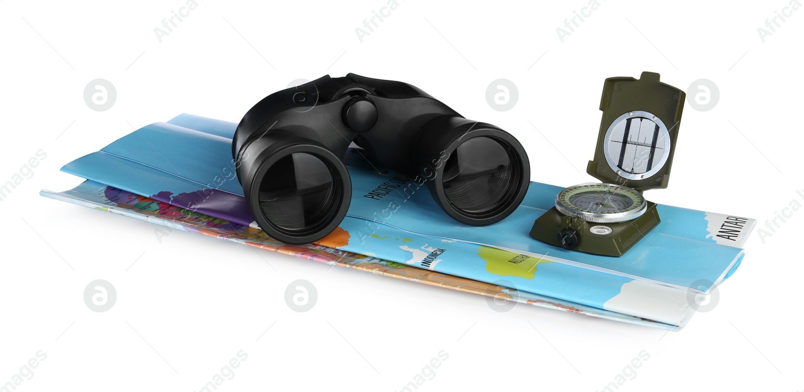 Photo of Modern binoculars, compass and map on white background