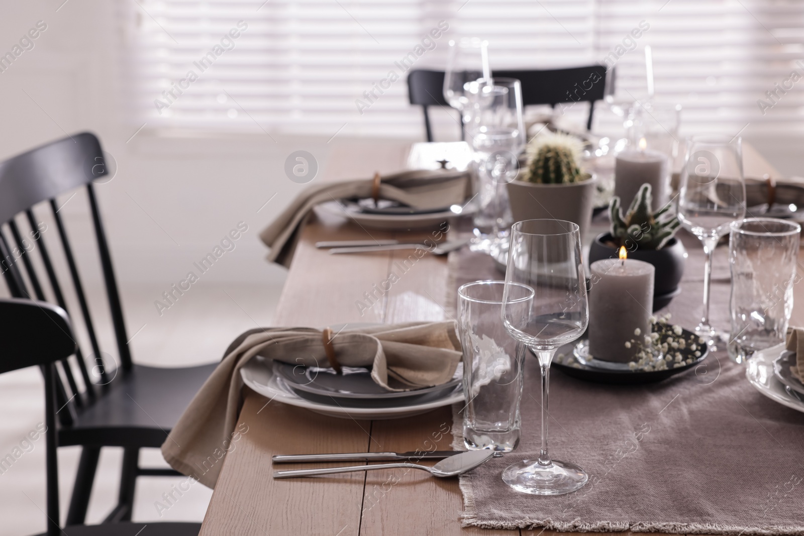 Photo of Festive table setting with beautiful tableware and decor indoors