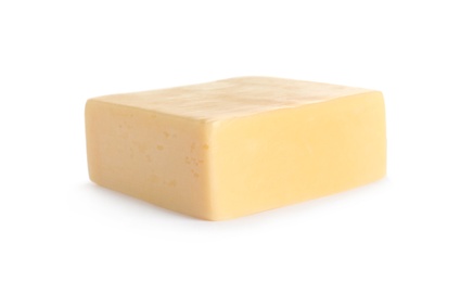 Piece of delicious cheese on white background