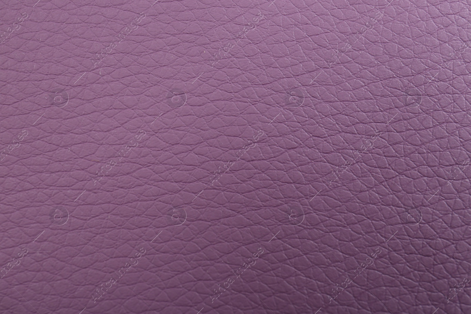 Photo of Beautiful purple leather as background, above view