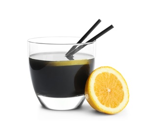 Glass with natural black lemonade on white background