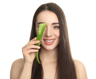 Young woman with aloe vera leaf on white background