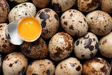 Photo of Fresh raw quail eggs as background, closeup
