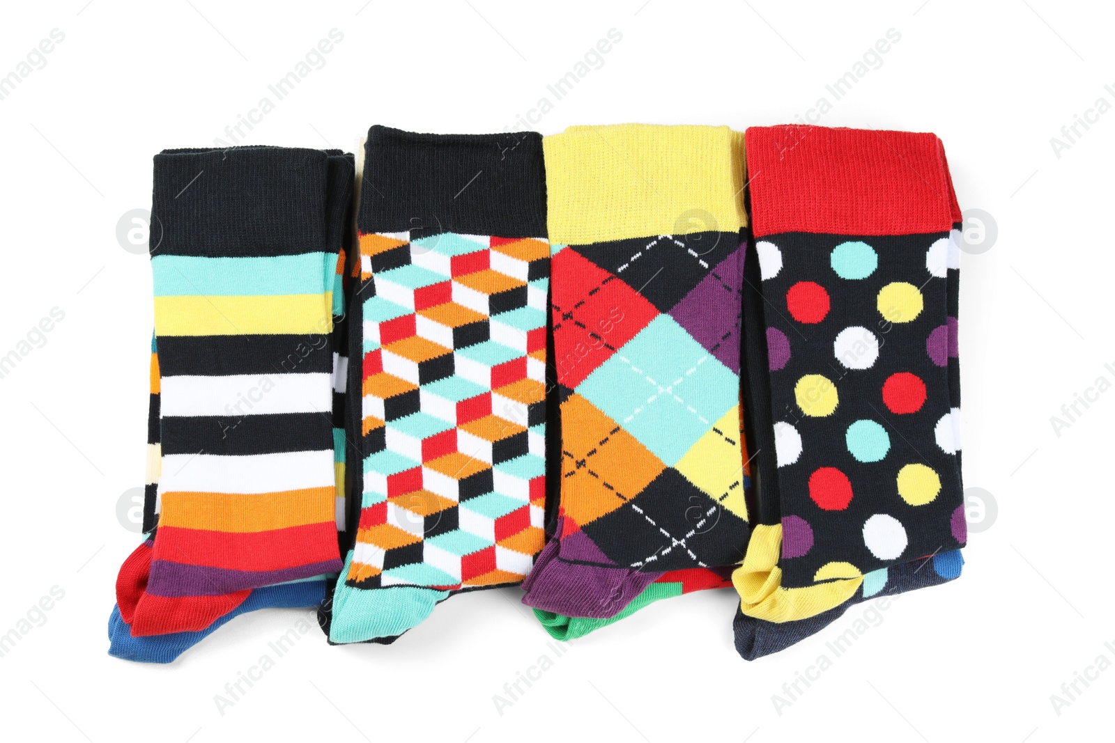 Photo of Colorful socks on white background, top view