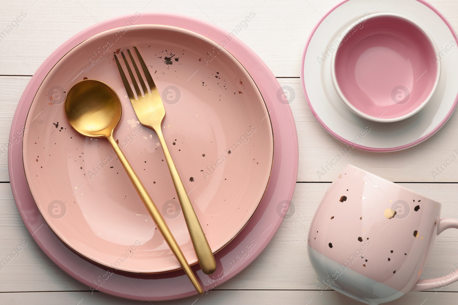 Photo of Stylish empty dishware and cutlery on white wooden table, flat lay