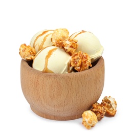 Photo of Delicious ice cream with caramel popcorn and sauce in wooden bowl on white background