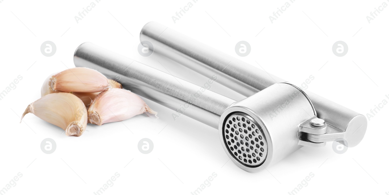 Photo of One metal garlic press and cloves isolated on white