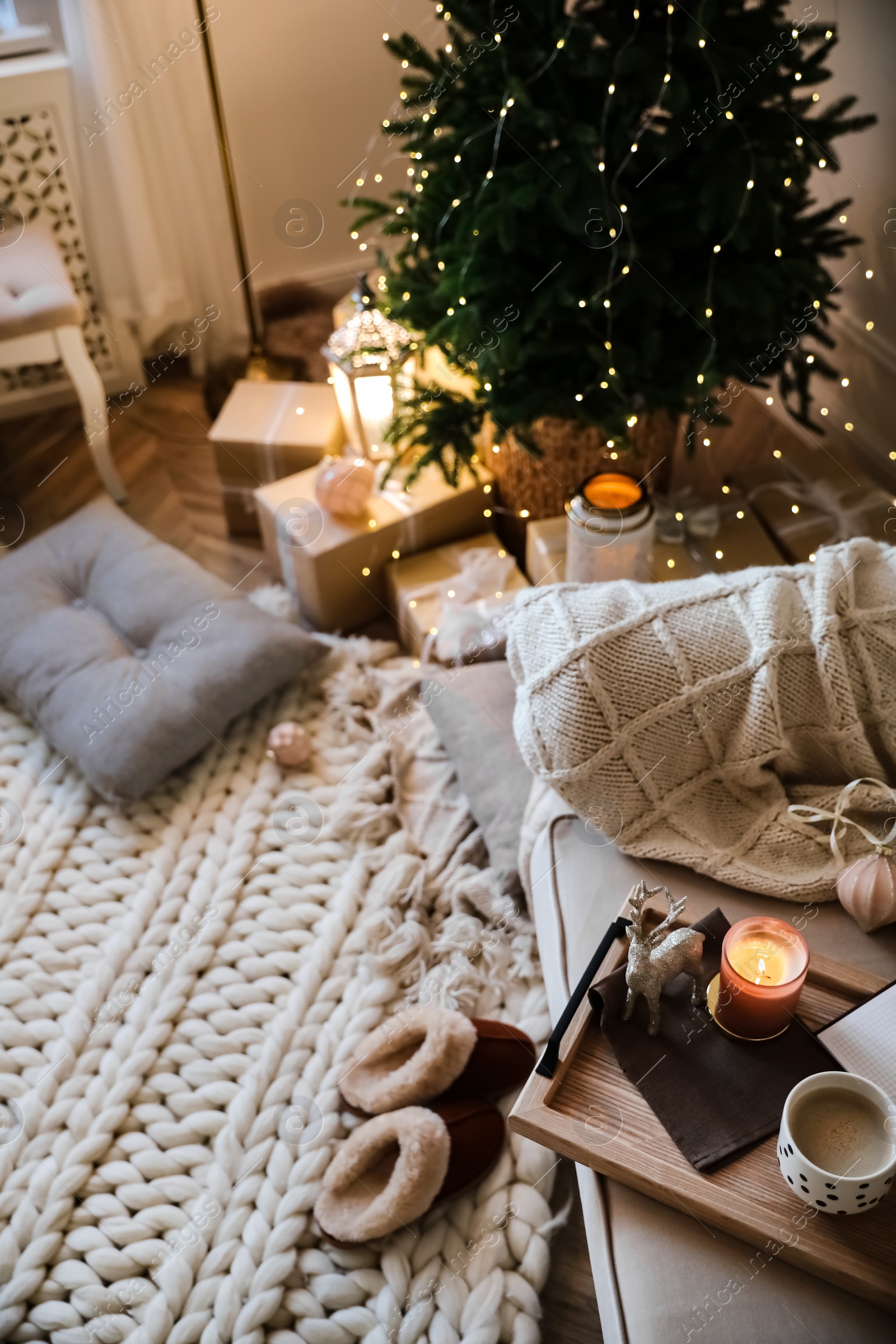 Photo of Beautiful Christmas tree in living room. Interior design