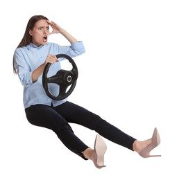 Photo of Angry woman with steering wheel against white background