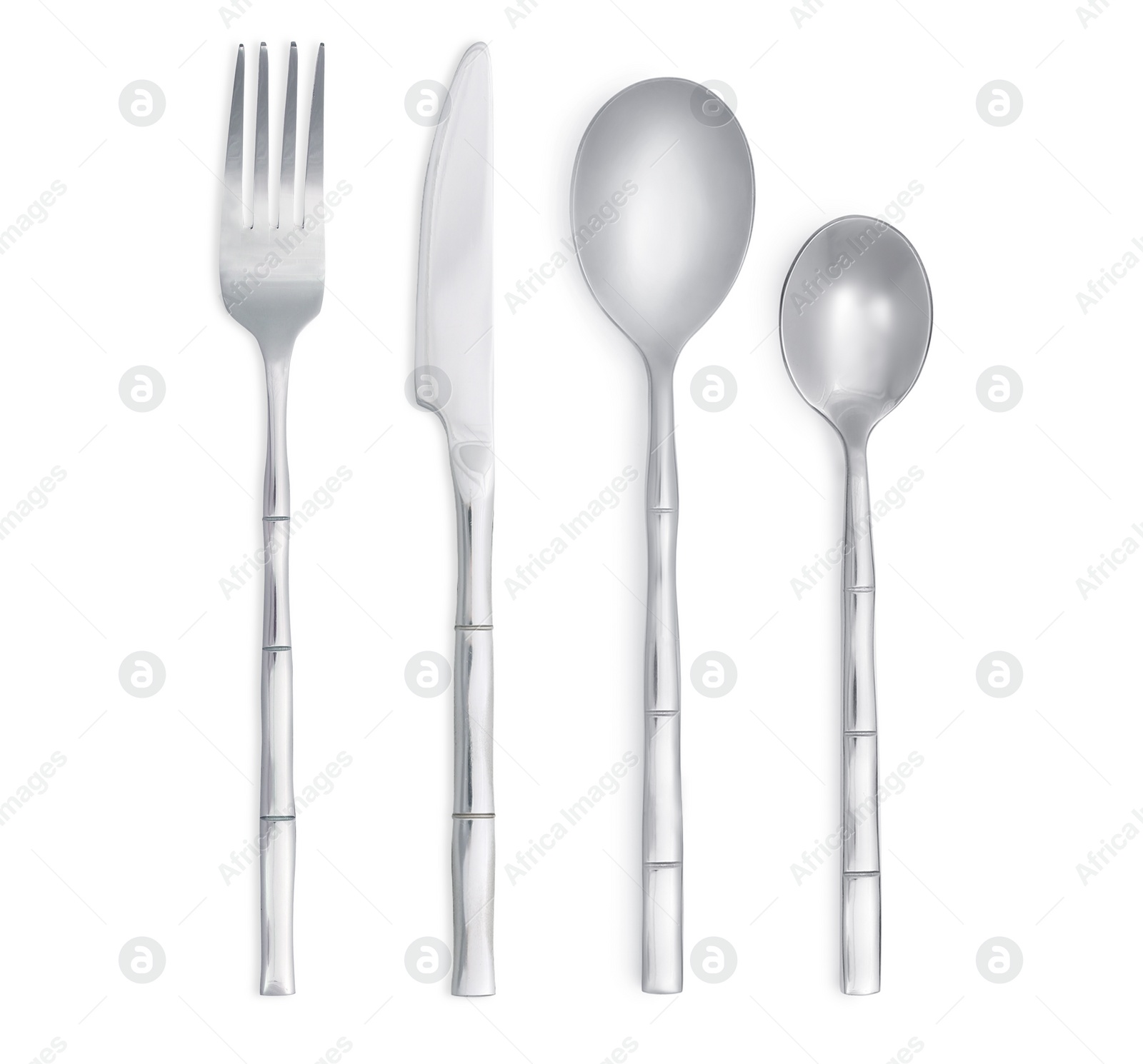 Image of Shiny silver cutlery set on white background, top view