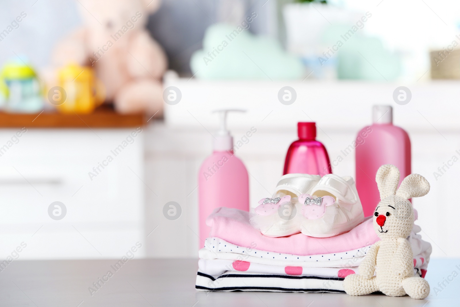 Photo of Set with baby accessories on table indoors, space for text