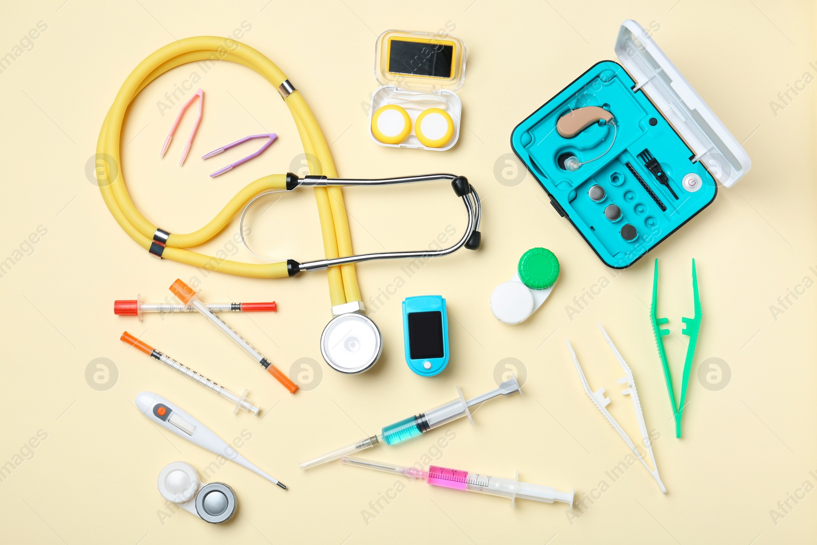 Photo of Flat lay composition with medical objects on color background