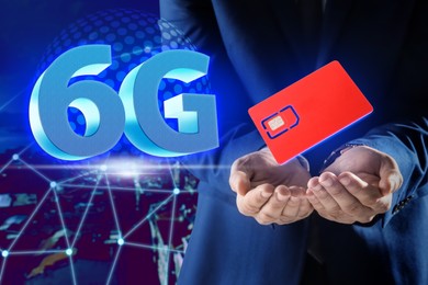 Image of Man demonstrating 6G SIM card model and cityscape with connection lines on background, closeup 