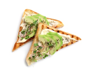 Tasty toasts with avocado, sprouts and chia seeds on white background, top view