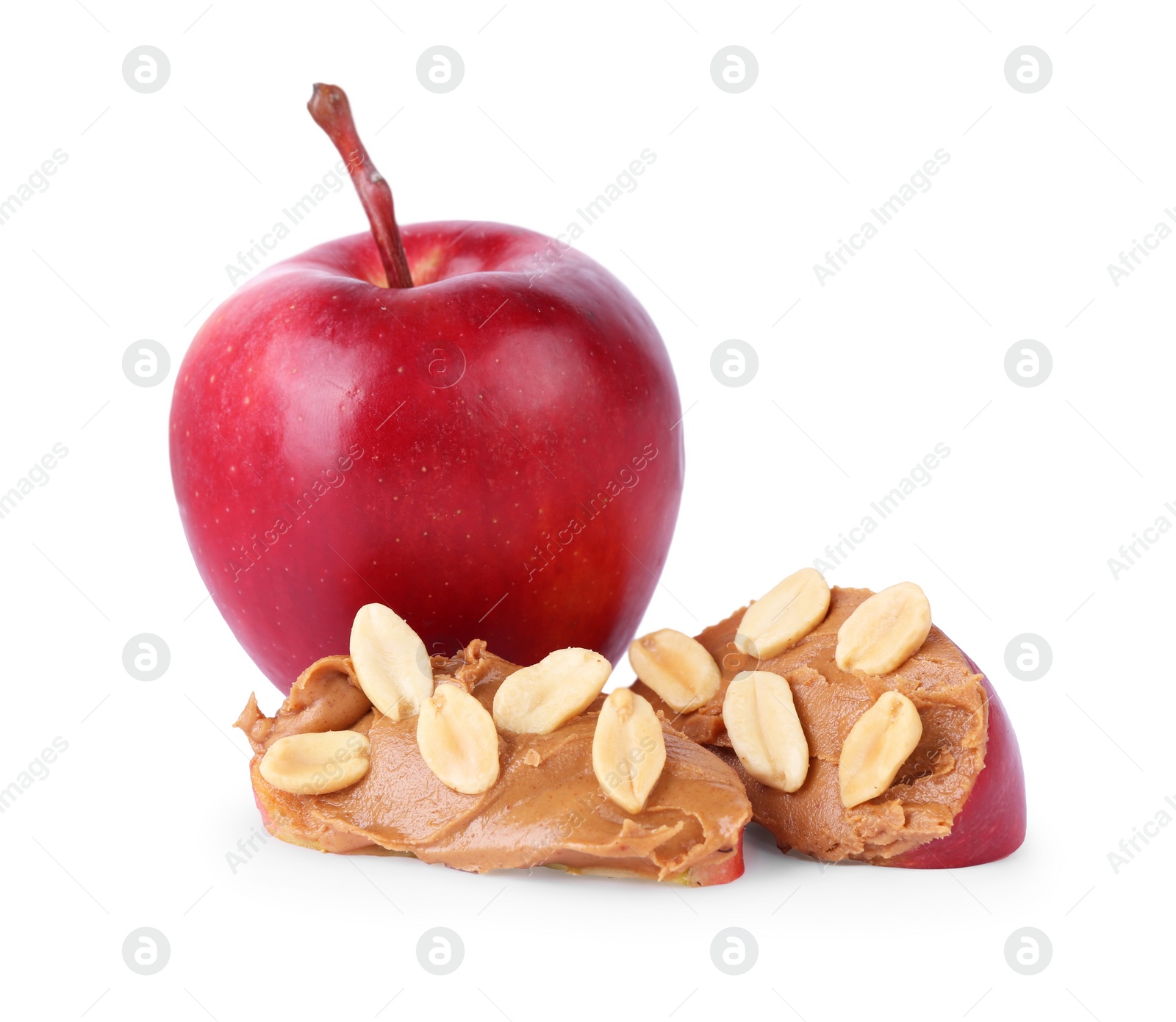 Photo of Slices of fresh apple with peanut butter, fruit and nuts isolated on white