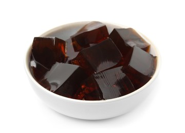 Photo of Delicious grass jelly cubes on white background