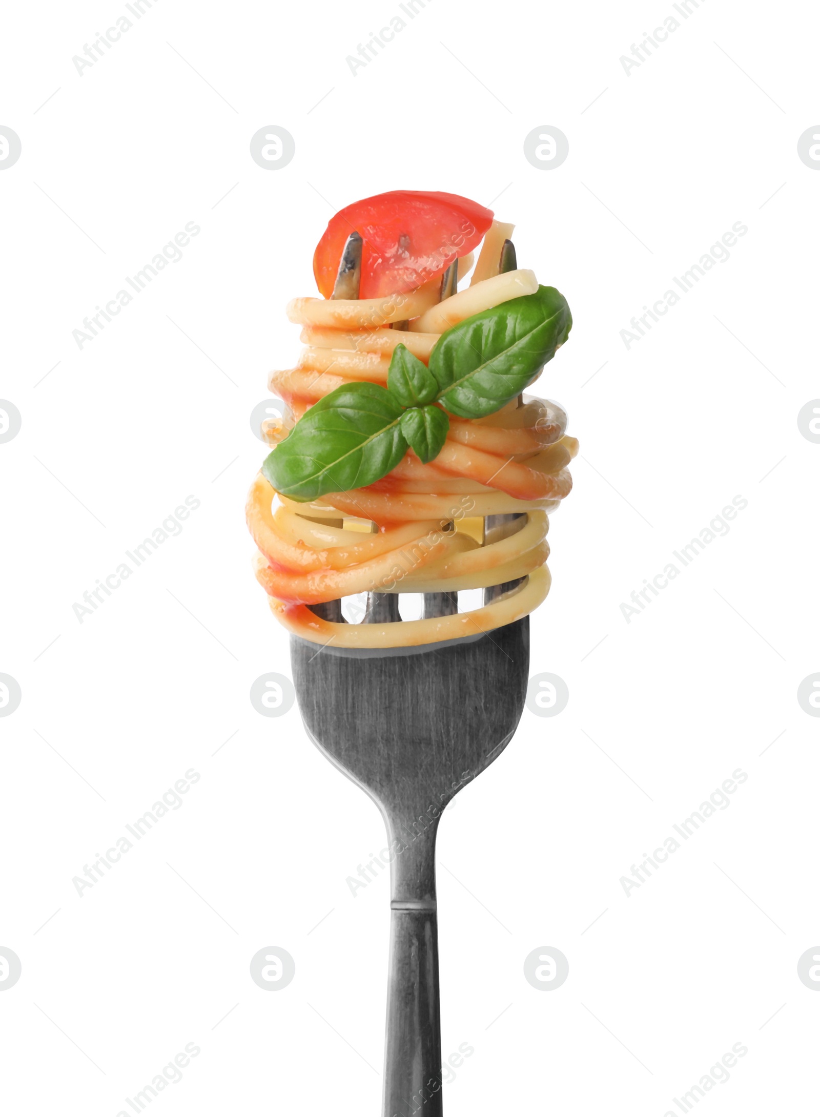 Photo of Fork with tasty pasta, tomato sauce and basil isolated on white