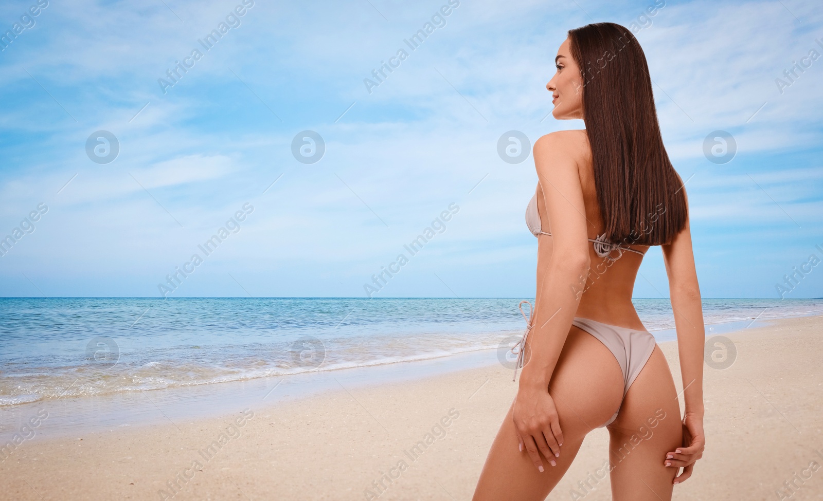 Image of Beautiful woman in stylish bikini on sandy beach near sea. Banner design with space for text