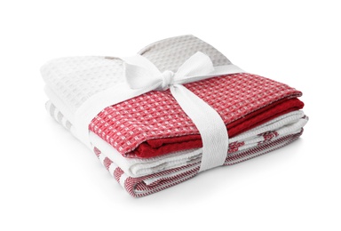 Stack of clean kitchen towels isolated on white