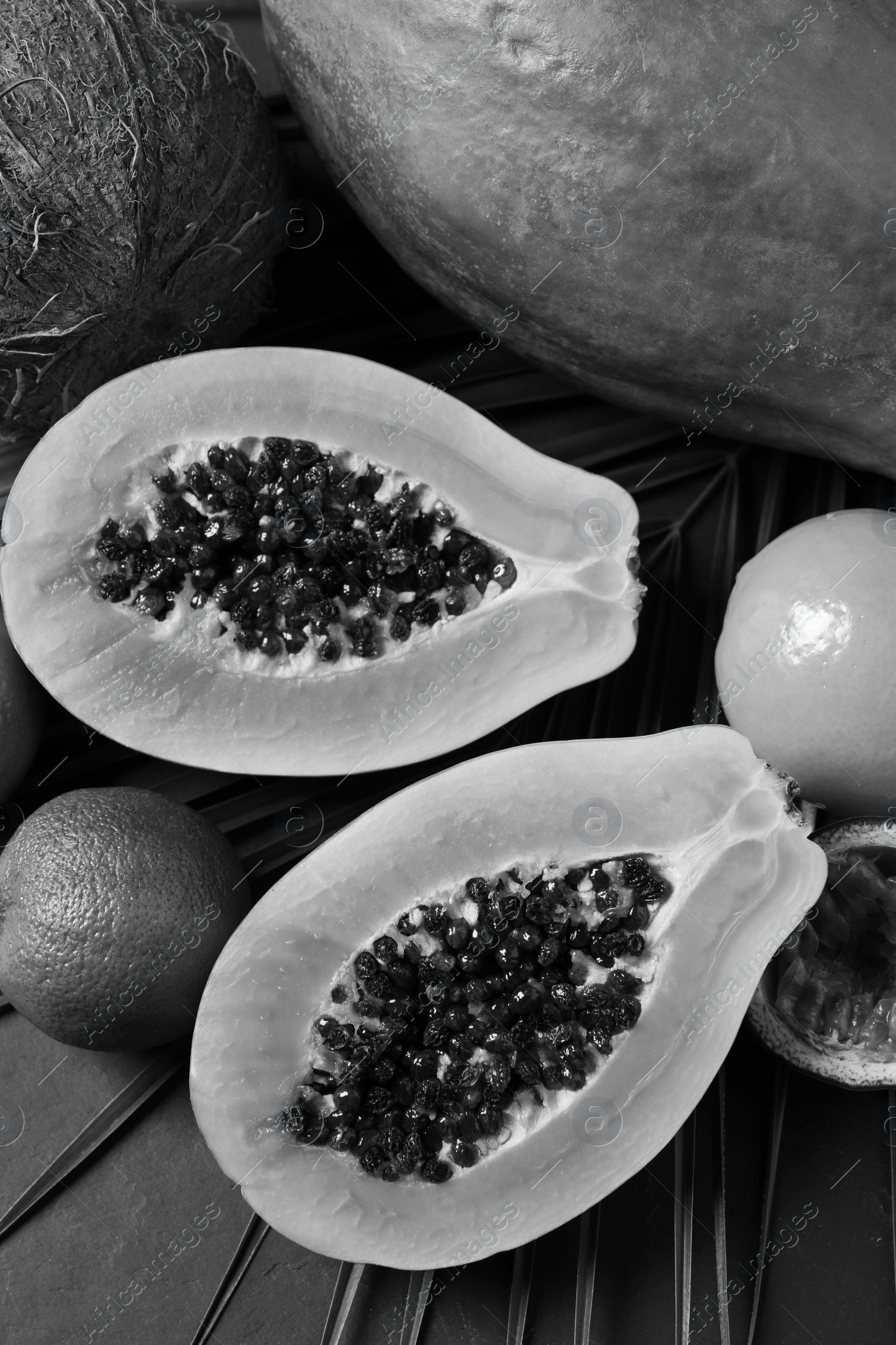 Image of Fresh papaya and other fruits on table, flat lay