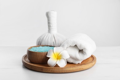 Photo of Spa composition with care products on white marble table