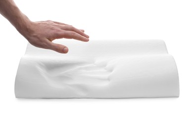 Photo of Man with orthopedic memory foam pillow on white background, closeup