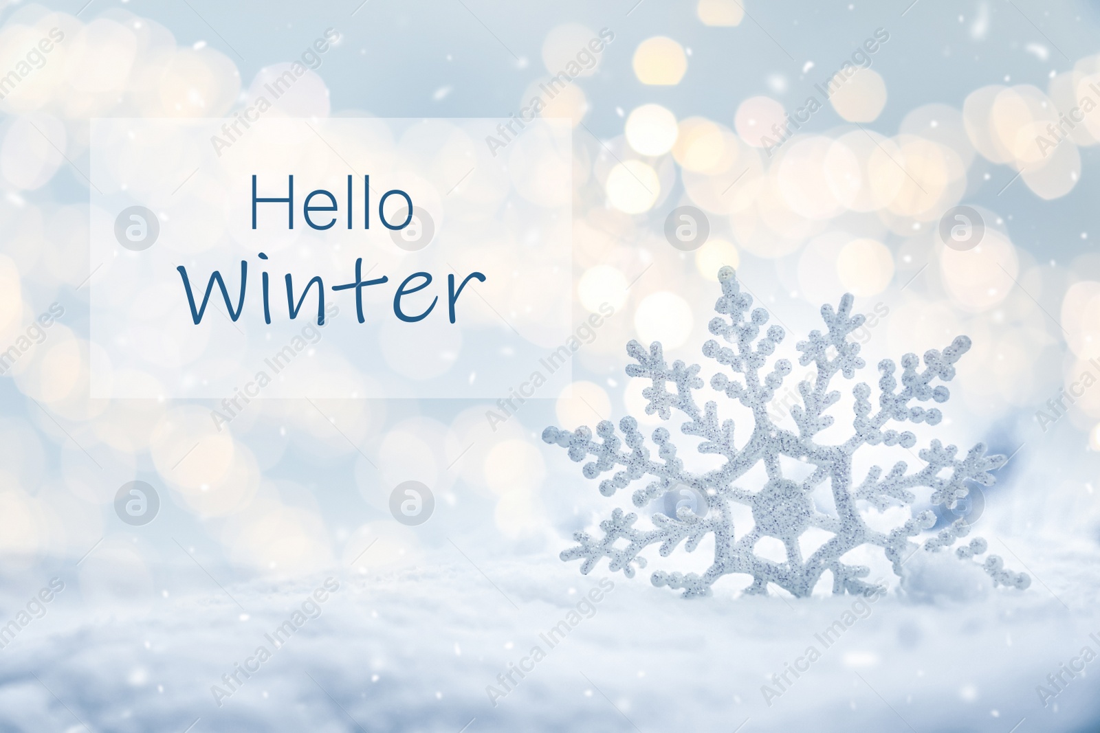Image of Hello Winter. Beautiful decorative snowflake in white snow, bokeh effect 