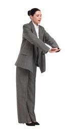 Beautiful young businesswoman in suit on white background