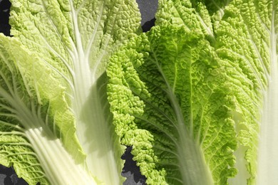 Fresh Chinese cabbage leaves on table, top view