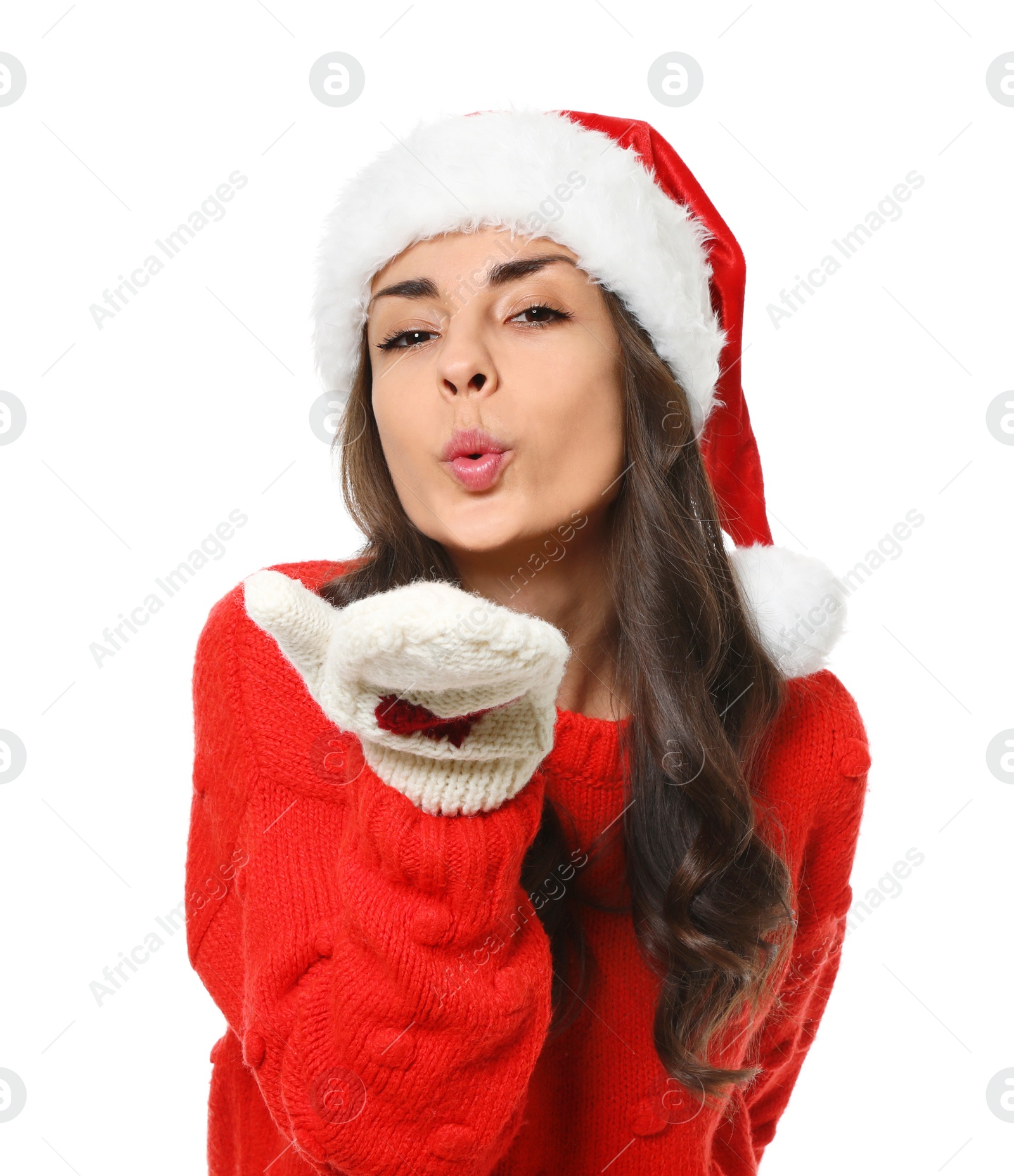 Photo of Young woman in Christmas sweater and hat on white background