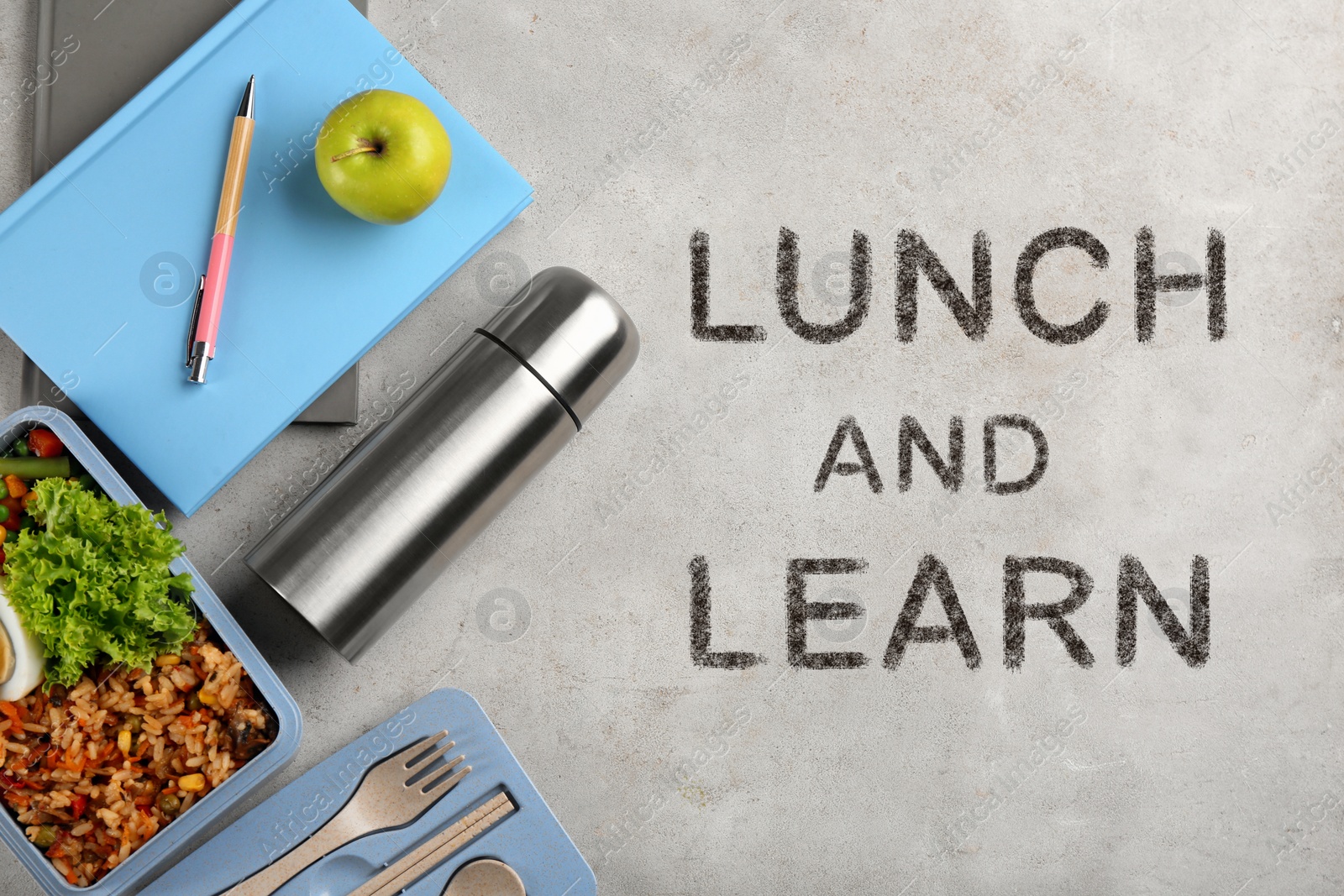 Image of Lunch and Learn concept. Flat lay composition with thermos, food and stationery on light grey table