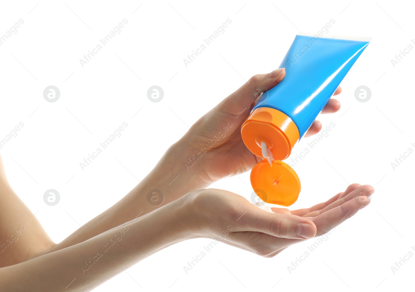 Photo of Woman applying sun protection cream on hand against white background, closeup