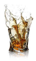 Whiskey splashing out of glass on white background