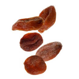 Many tasty dried apricots on white background