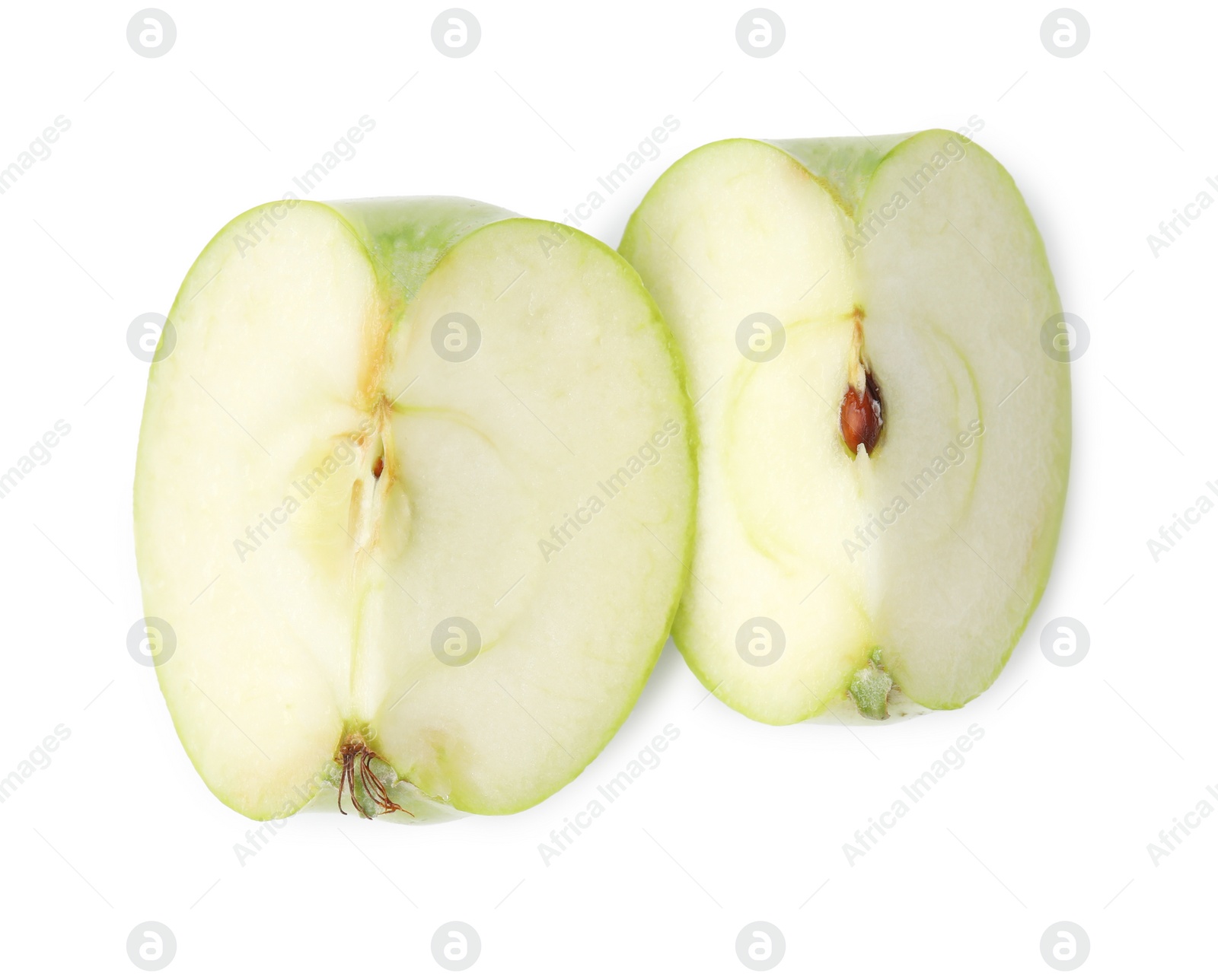 Pieces of ripe green apple isolated on white, top view Photo of Pieces of ripe green apple isolated on white, top view