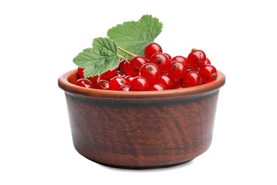 Photo of Tasty ripe redcurrants and green leaves in bowl isolated on white