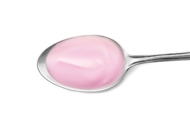 Photo of Spoon with yummy yogurt on white background