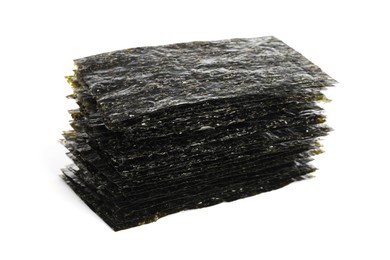 Photo of Stack of dry nori sheets on white background