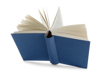 Photo of Open blue hardcover book isolated on white