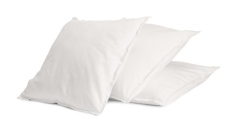 Photo of Many new soft pillows isolated on white