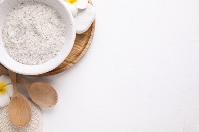 Photo of Flat lay composition with sea salt on white background, space for text. Spa treatment