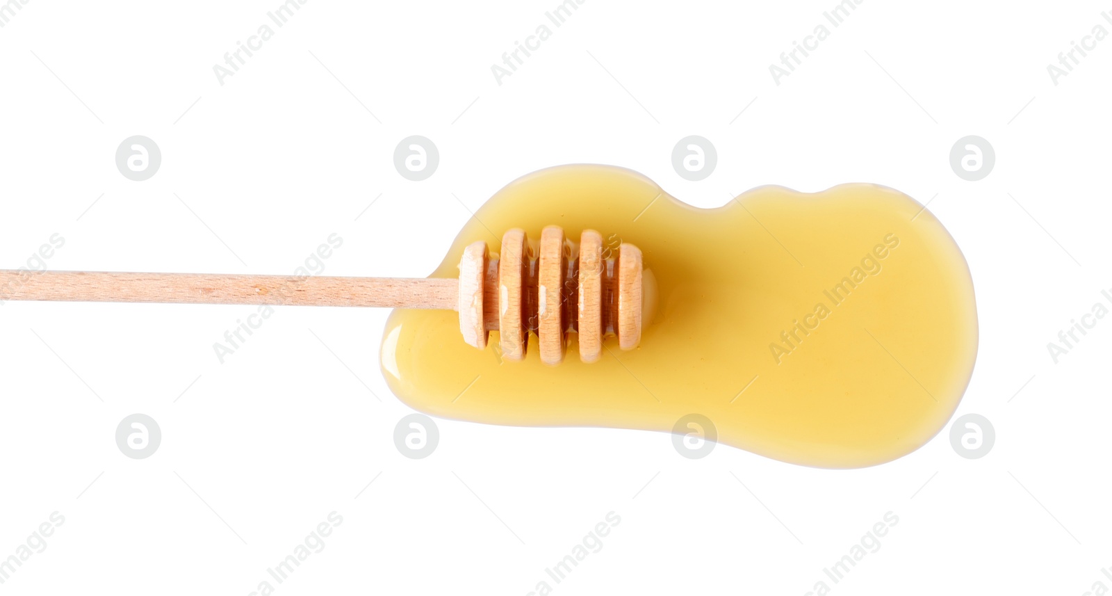 Photo of Wooden dipper and fresh honey on white background, top view