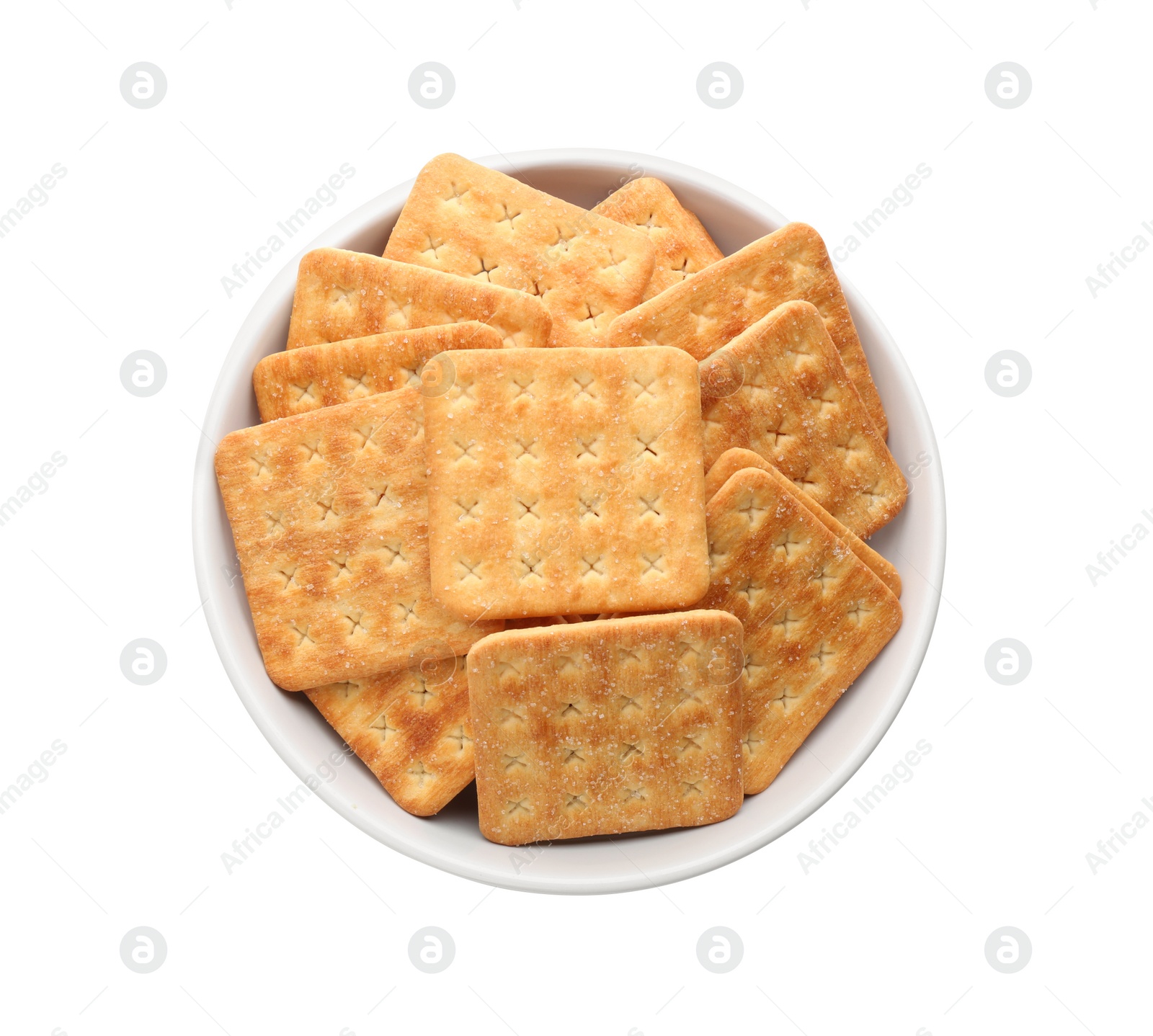 Photo of Delicious crackers in bowl isolated on white, top view