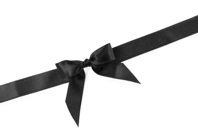 Photo of Black satin ribbon with bow on white background, top view