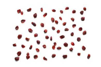 Flat lay composition of cranberries on white background. Dried fruit as healthy snack