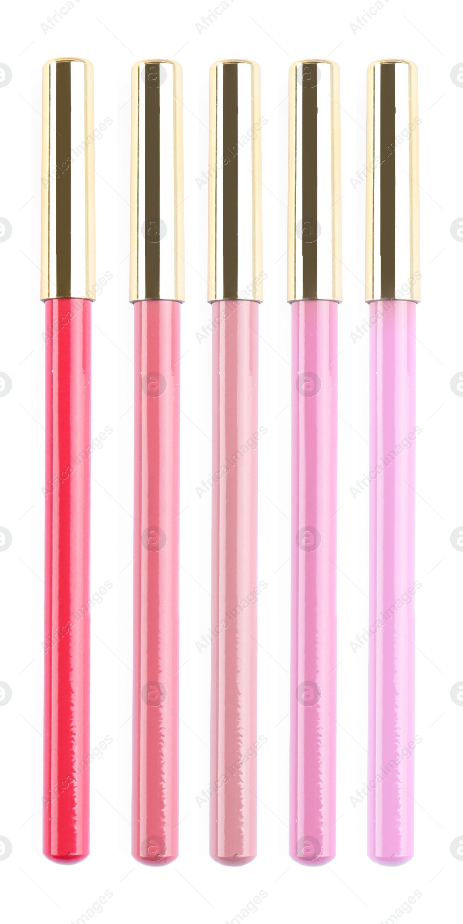 Image of Set with lip pencils of different shades on white background. Decorative cosmetics